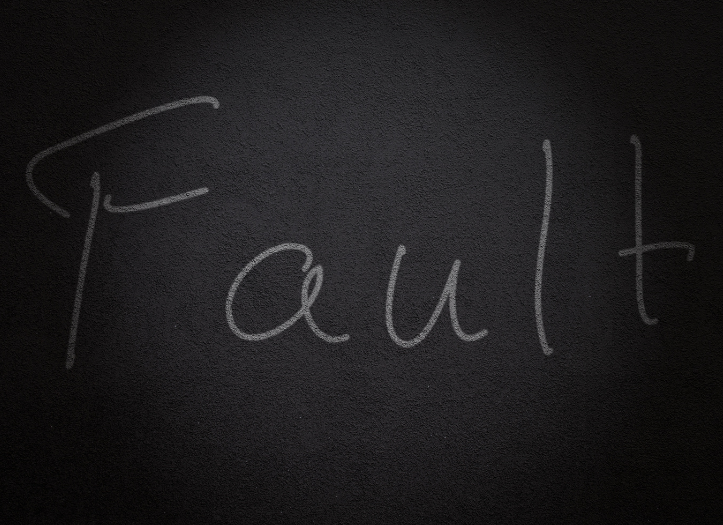 word fault written on chalkboard