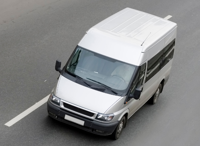 van driving down highway